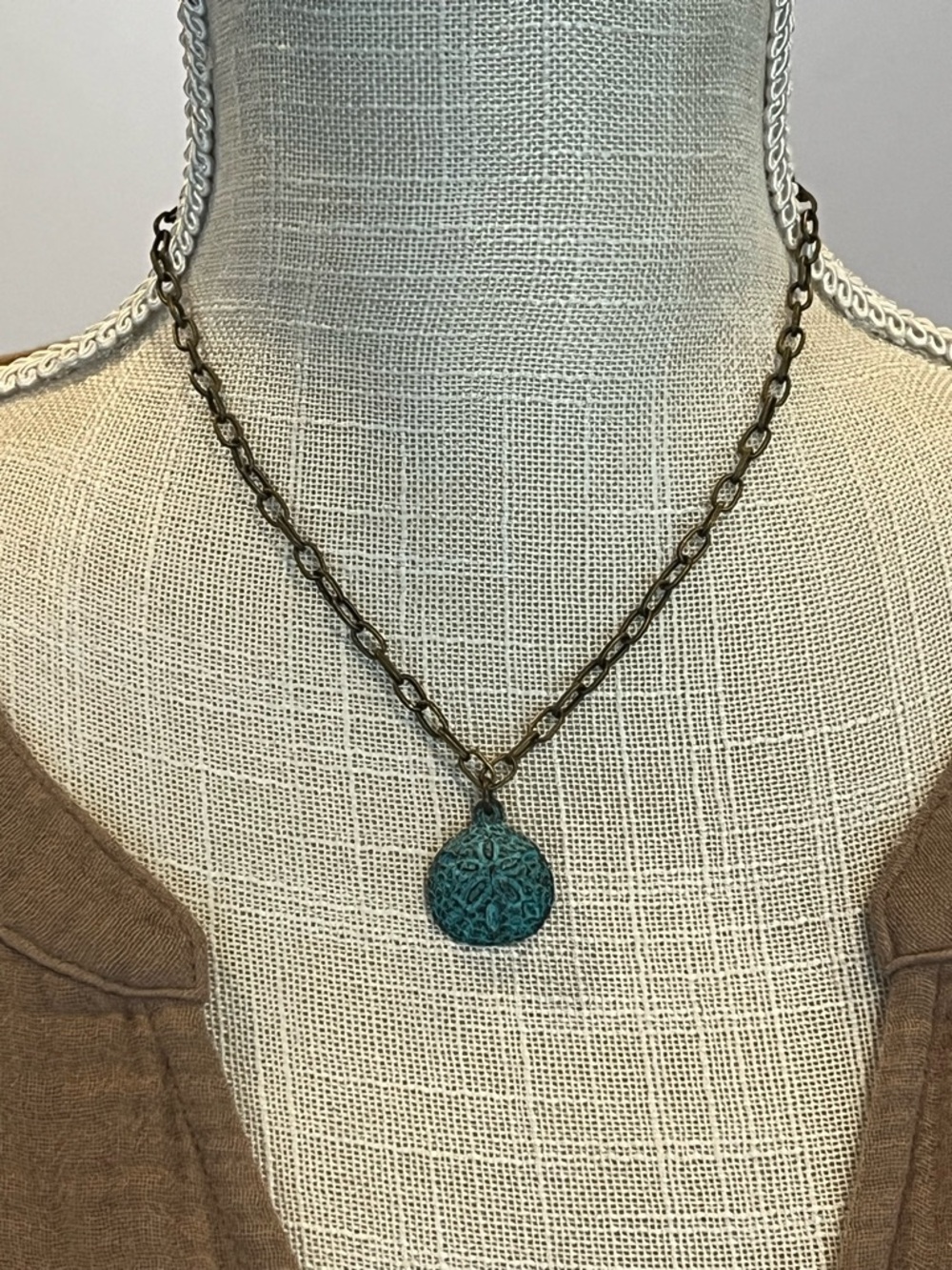 Patina Sand Dollar Pendant Necklace